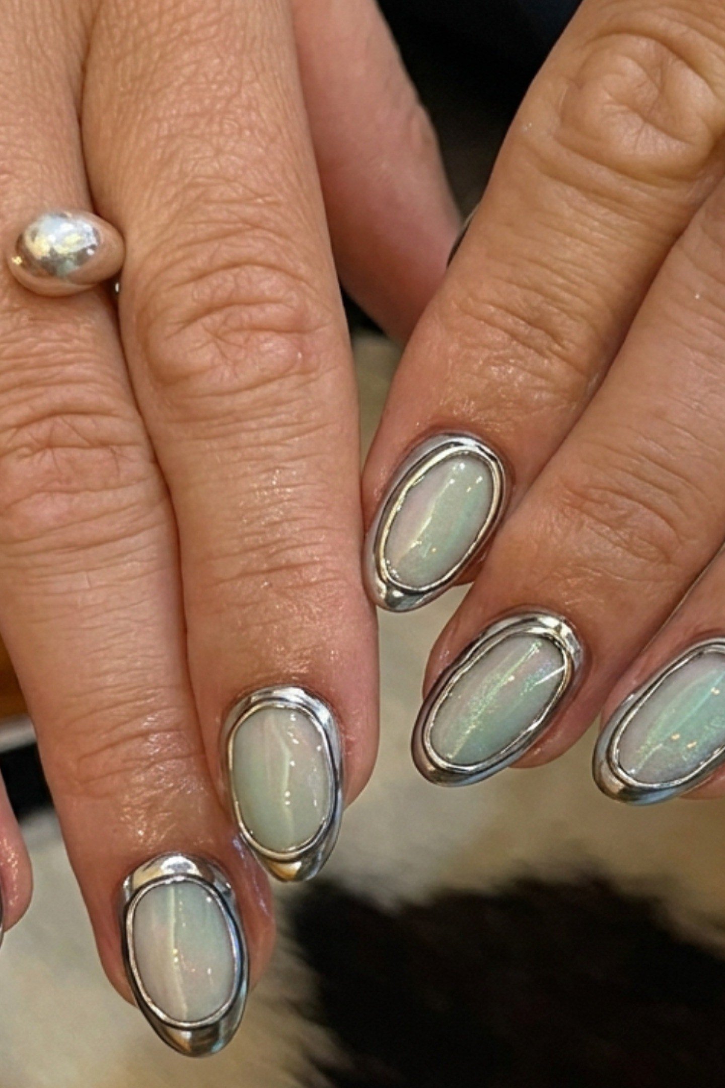 Silver Chrome Oval Nails with Pearl Ring - manicure idea for women over 40