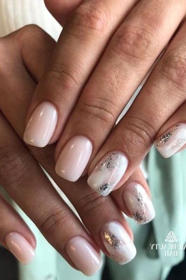 White Nails with Silver Marble Accent - manicure idea for women over 40