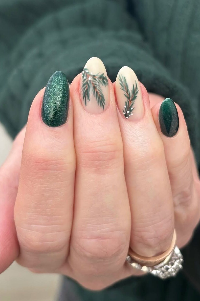 Green nails with pine sprig nail art, nature inspired winter manicure