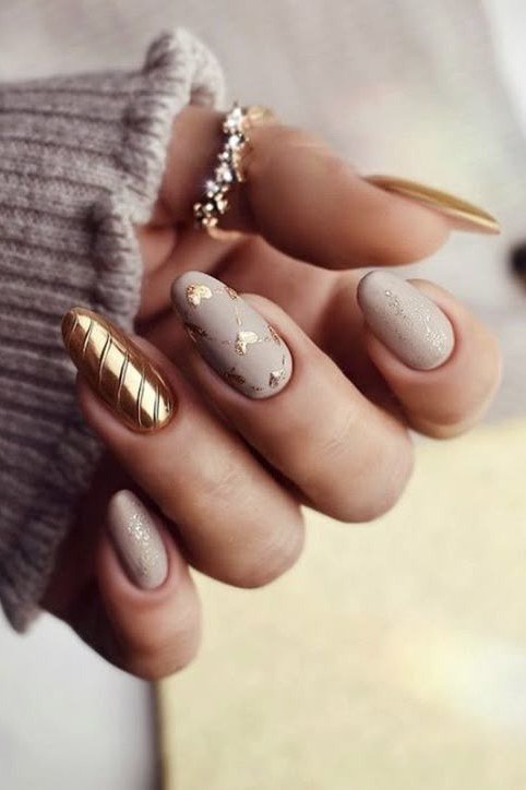 Taupe nails with fine gold line art, minimal elegant winter nails