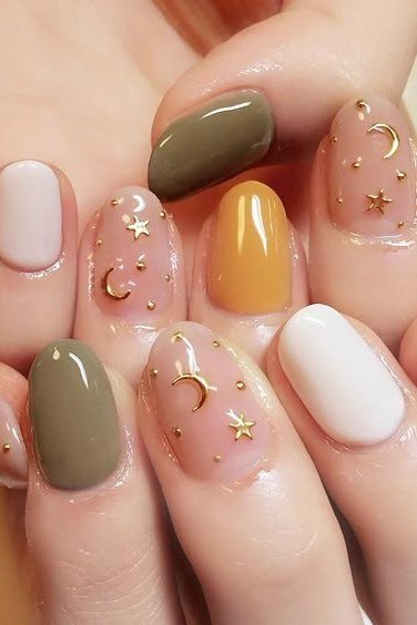 Sage, Mustard and White with Gold Stars on short oval nails for women over 60