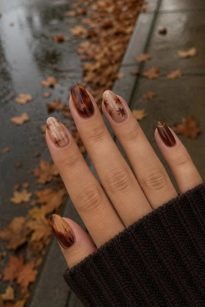 Tortoiseshell with Plaid and Leaf Accents on short oval nails for women over 60