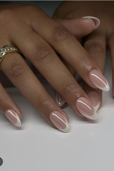 Crisp White French on short oval nails for women over 60