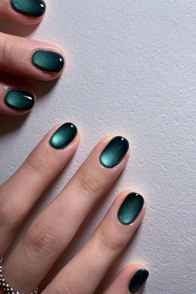 Teal Green Cat-Eye on short oval nails for women over 60
