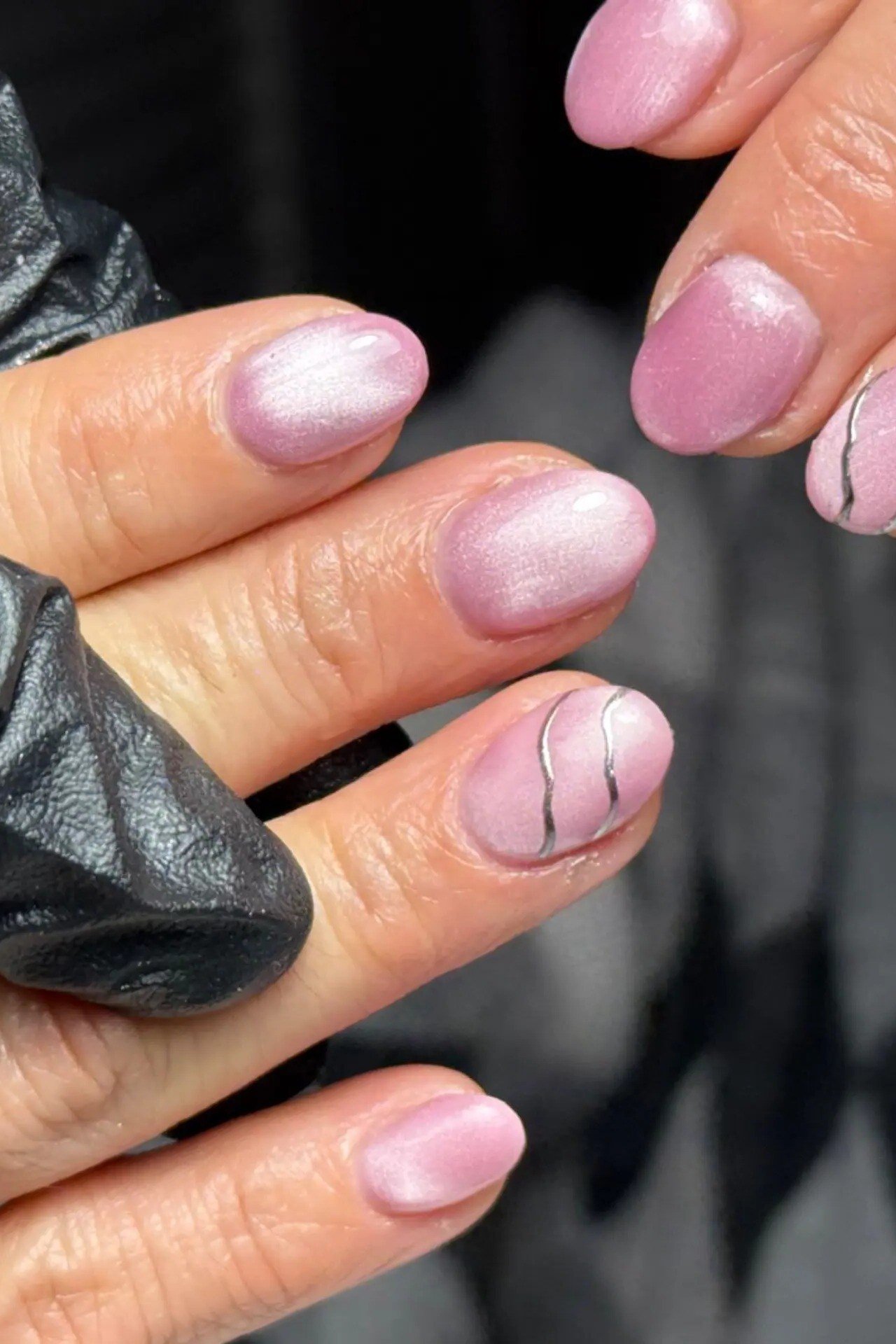 Pink Shimmer with Metallic Wave Lines on short oval nails for women over 60