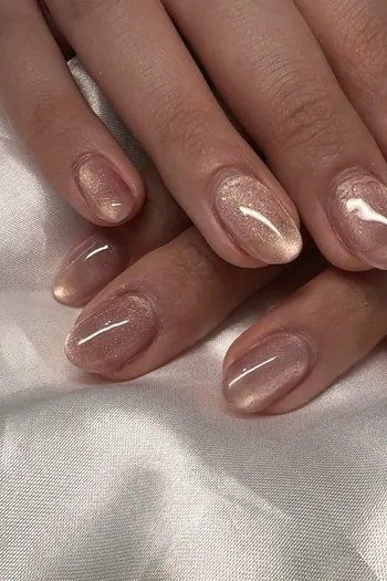 Pearl Nude Glaze on short oval nails for women over 60