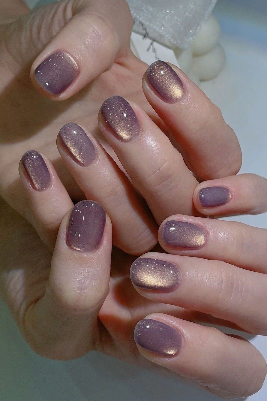 Mauve Cat-Eye Shimmer on short oval nails for women over 60