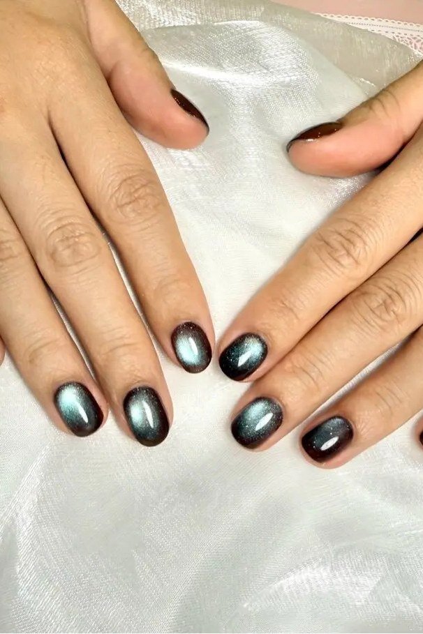 Black-Green Cat-Eye on short oval nails for women over 60