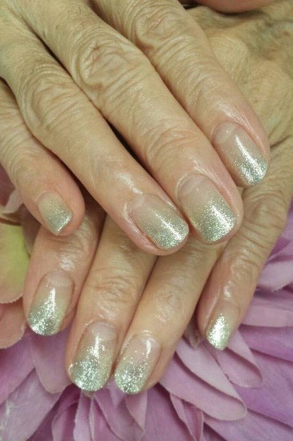 Silver Glitter Ombre on short oval nails for women over 60