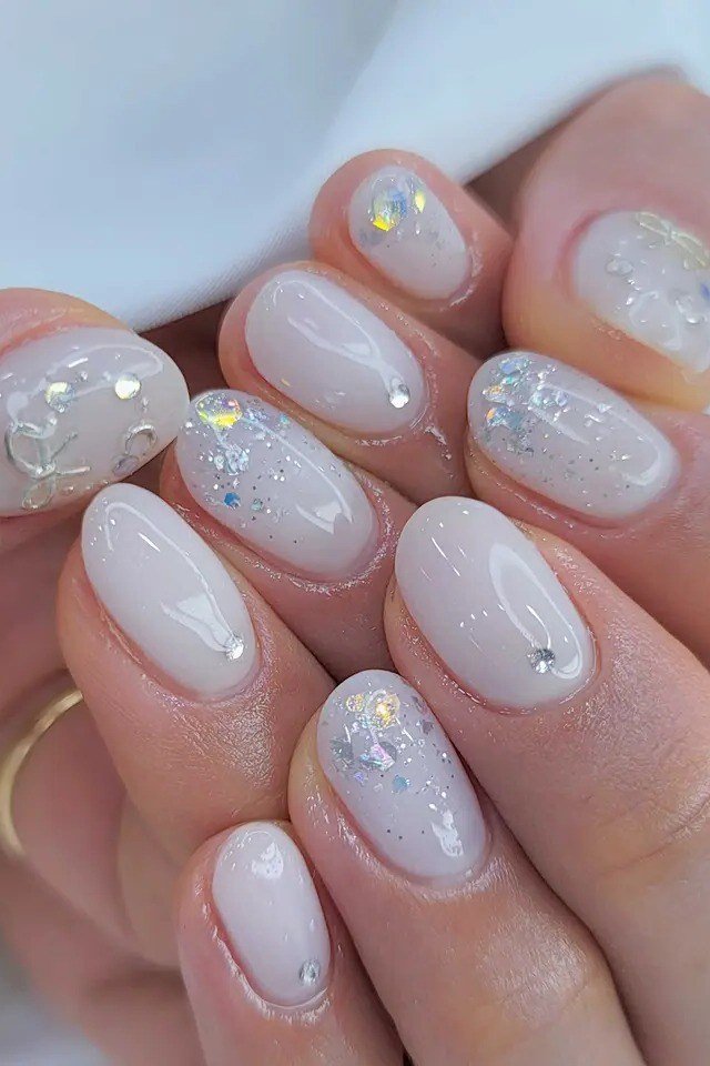 White Iridescent Glitter with Crystals on short oval nails for women over 60
