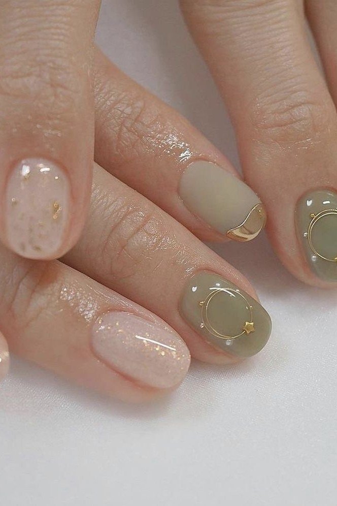 Sage Green with Gold Circle Art on short oval nails for women over 60