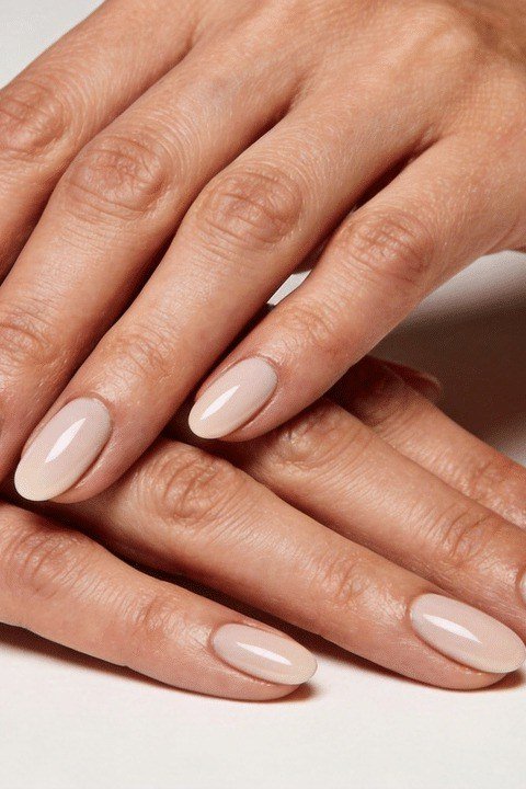 Elegant short pale pink natural nails, neat and simple for women over 40