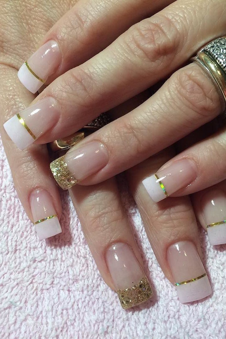 Elegant nude French tips with thin gold glitter stripes for women over 40