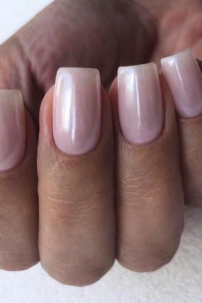 Elegant pearly pink shimmer short nails, subtle and chic for women over 40