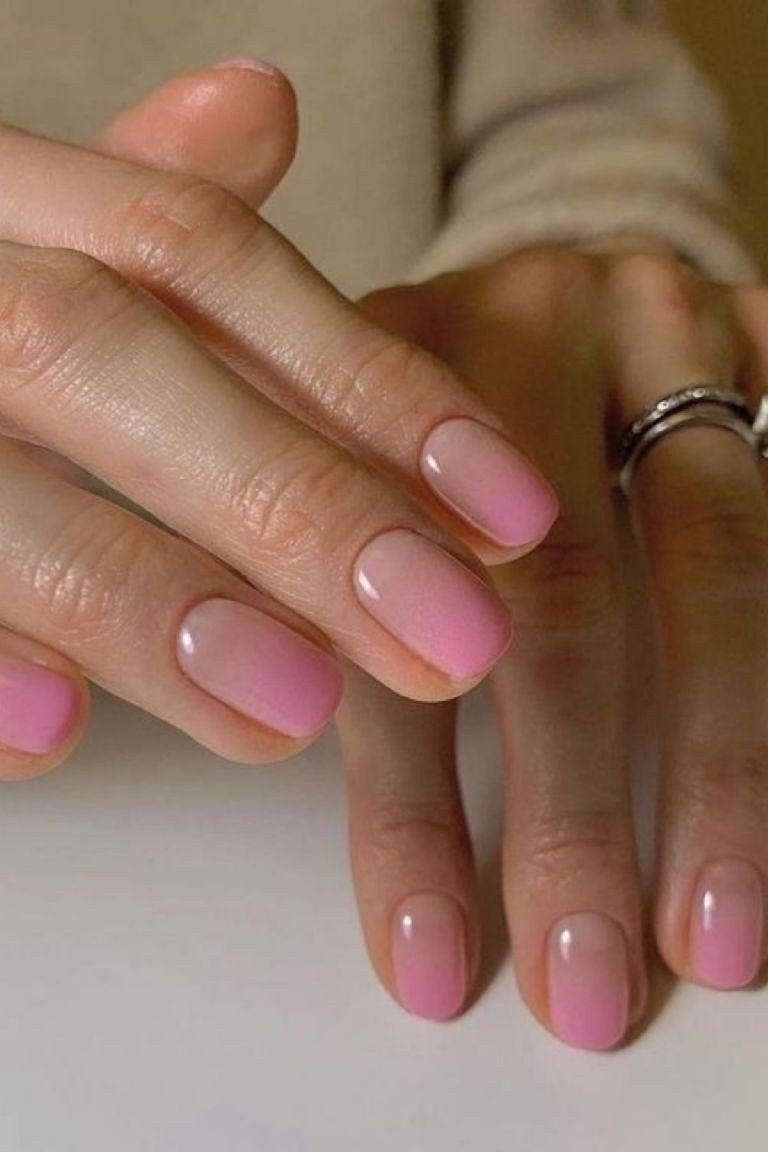 Elegant bright pink glossy short nails, cheerful for women over 40
