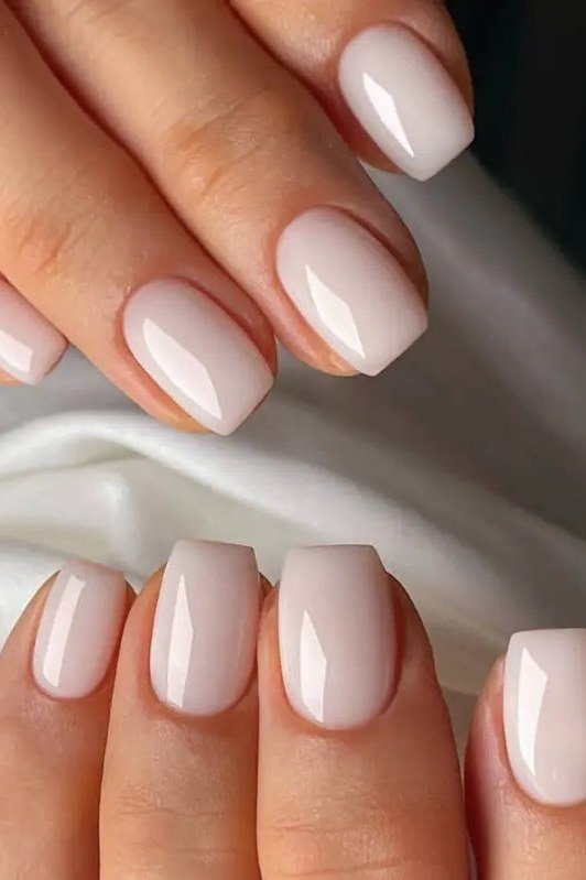 Pale pink squoval nails, closeup