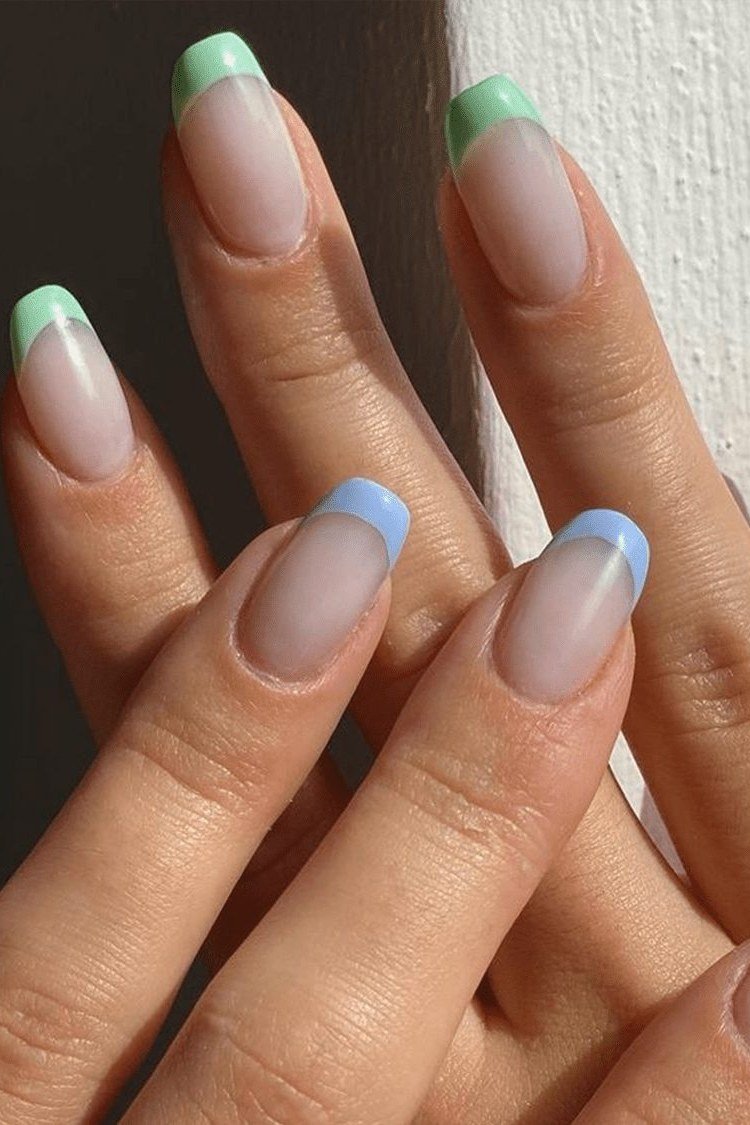 Pastel mint and blue french tip oval nails with gold ring