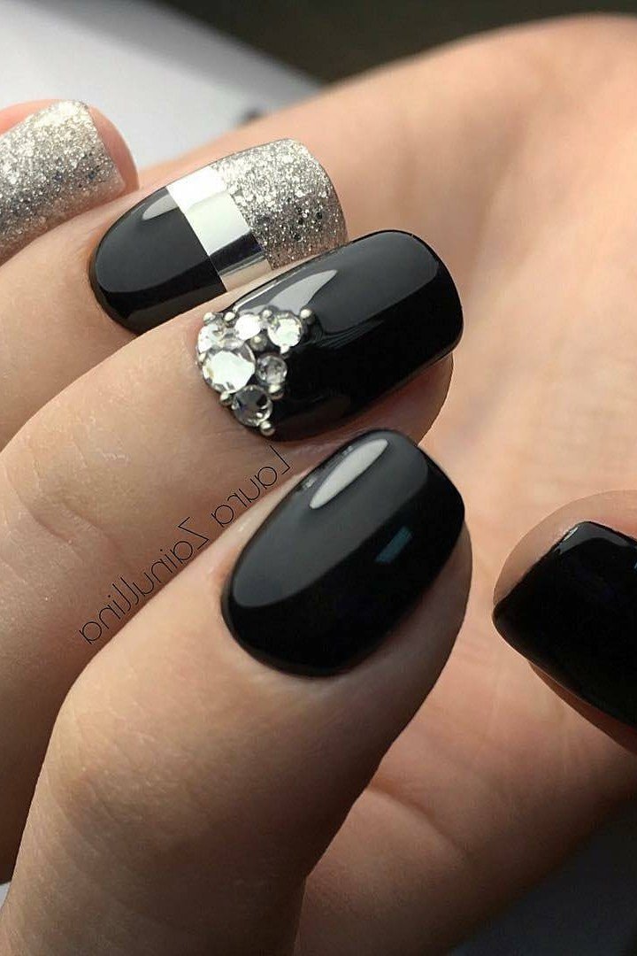Black squoval nails with silver glitter accent nail