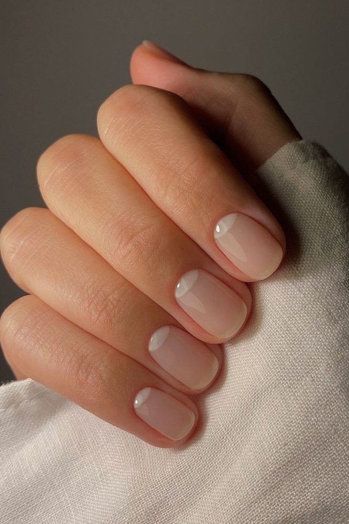 Nude squoval nails on hand
