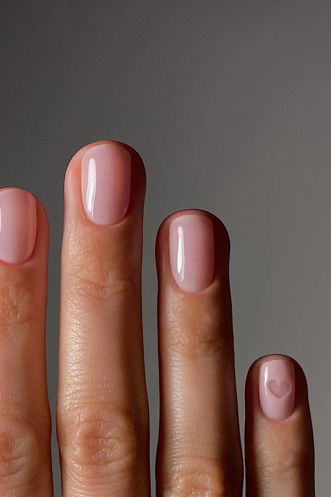 4. Soft Pink-Nude Oval Nails with a Healthy Shine - nail art idea for women over 40
