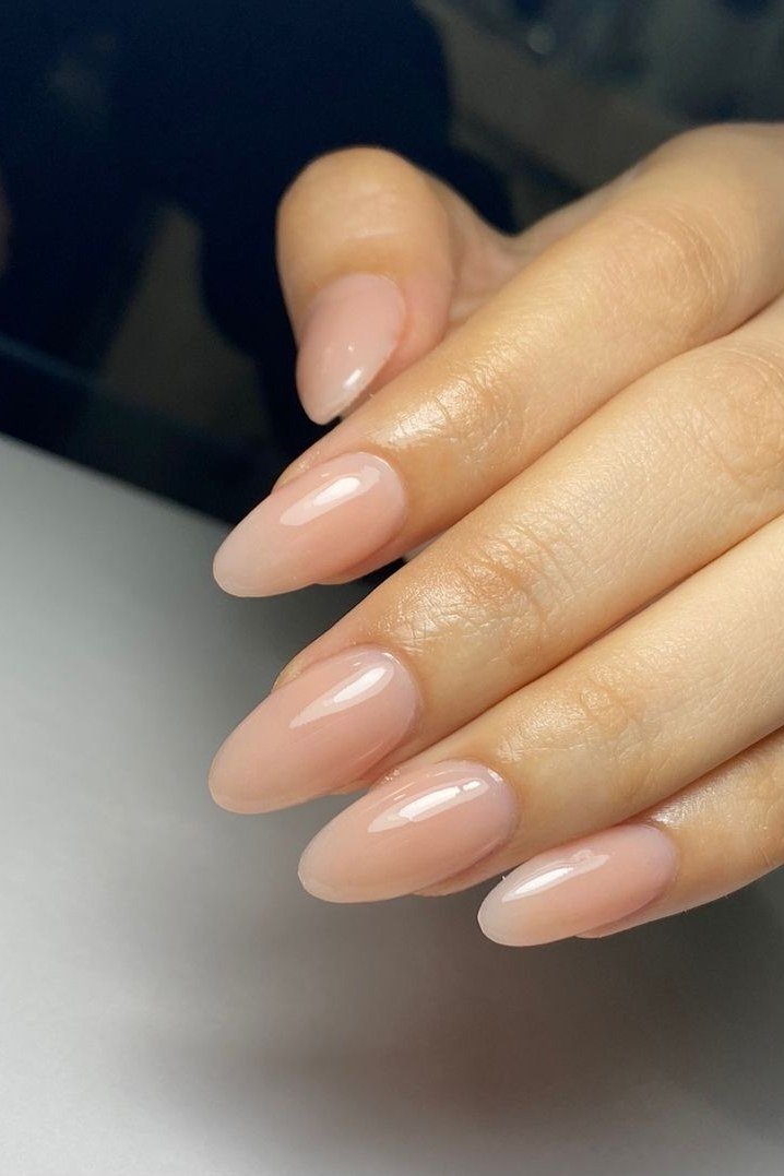 7. Glossy Nude Almonds for Everyday Elegance - nail art idea for women over 40
