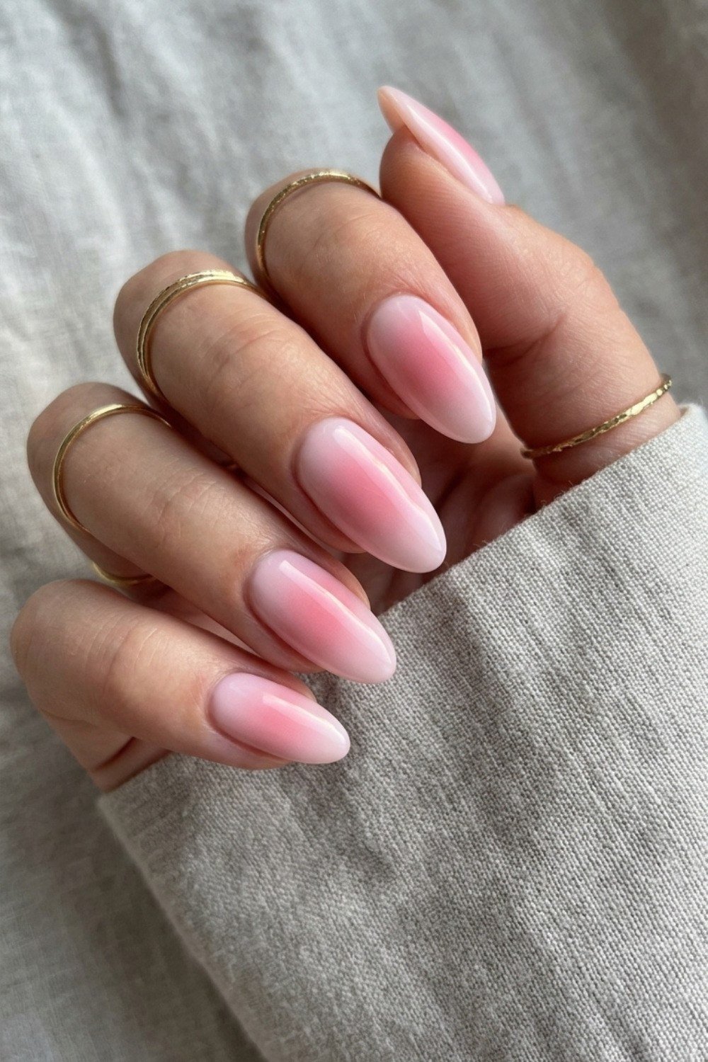 17. Pink Ombre Almonds with Gold Rings - nail art idea for women over 40