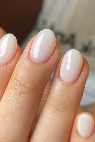 18. Milky White Short Almond Nails - nail art idea for women over 40