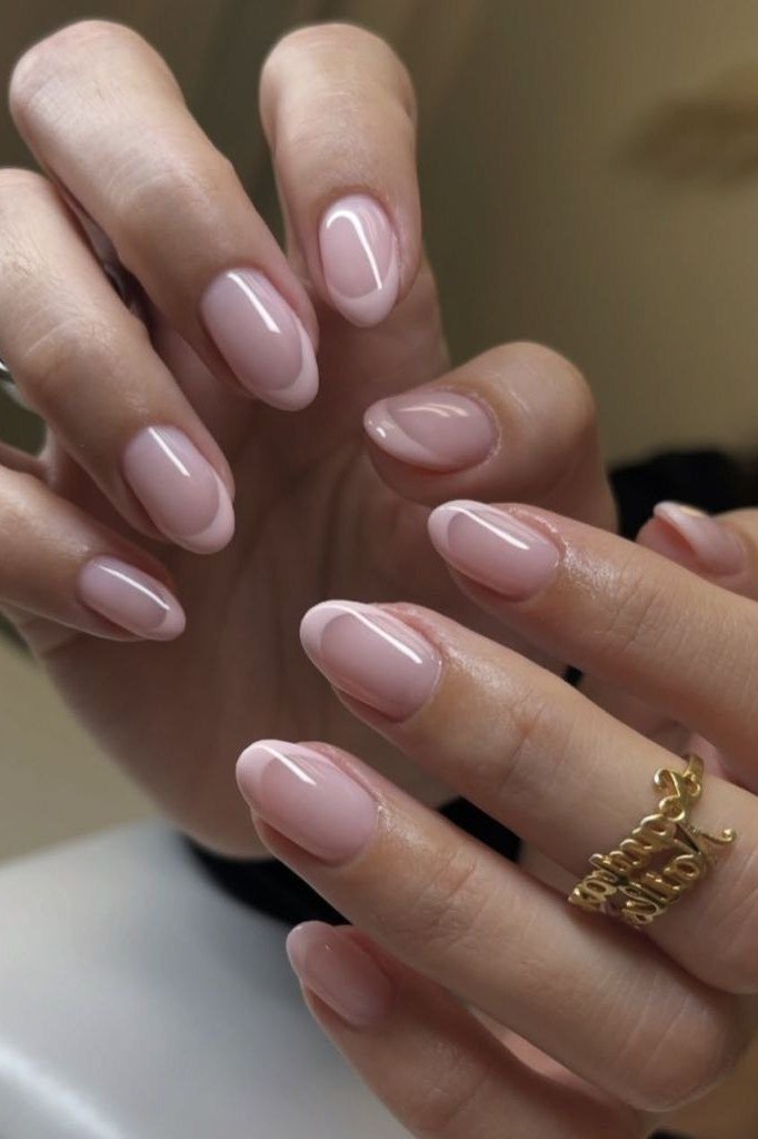 19. Soft Pink Ovals with a Gold Ring - nail art idea for women over 40