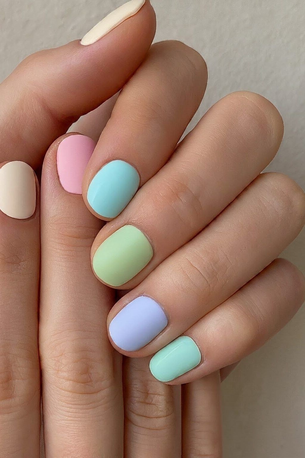20. Pastel Rainbow Short Square Nails - nail art idea for women over 40