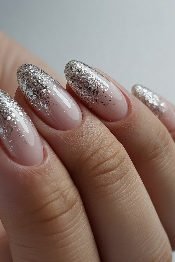 30. Silver Glitter Ombre Almond Nails - nail art idea for women over 40