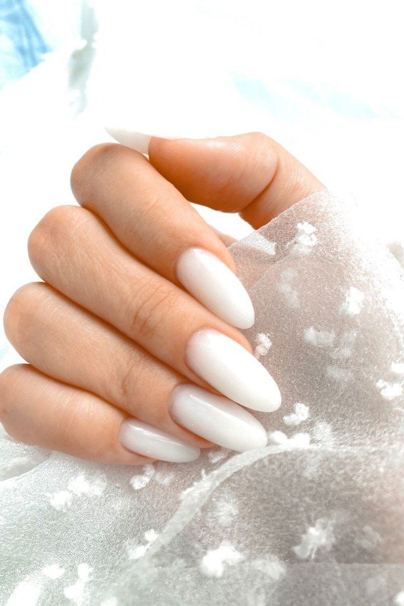 33. Bridal White Almond Nails - nail art idea for women over 40
