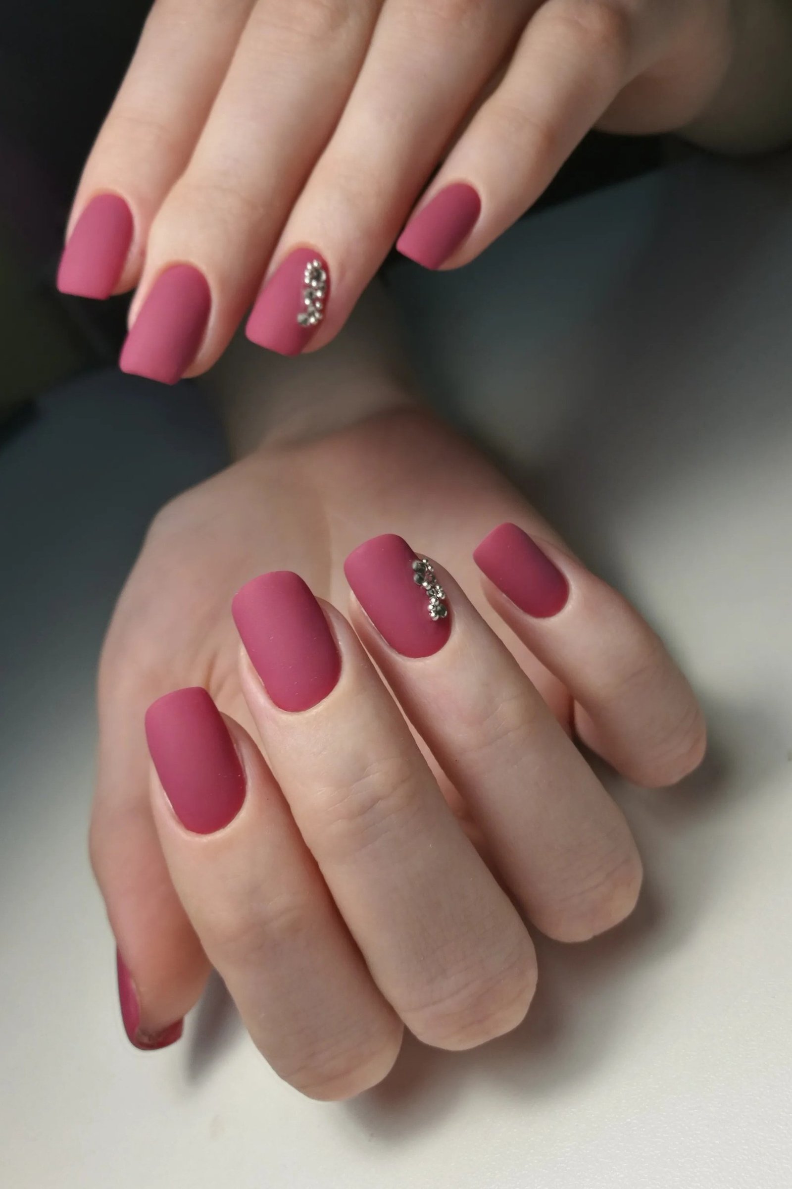 44. Matte Berry with a Glitter Accent Nail - nail art idea for women over 40