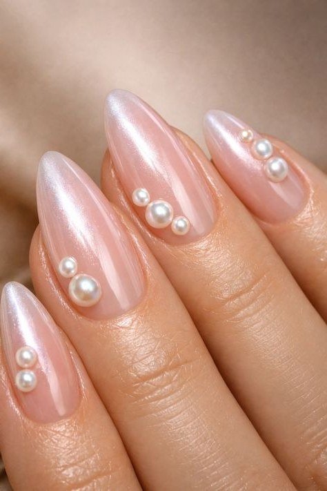 45. Sheer Pink with Scattered Pearl Details - nail art idea for women over 40