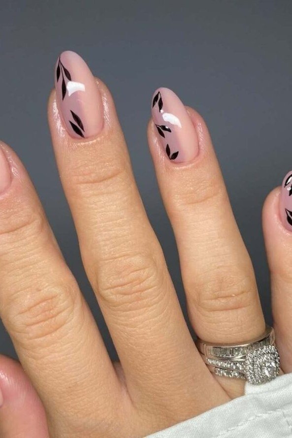 46. Nude Nails with Minimal Black Leaf Art - nail art idea for women over 40