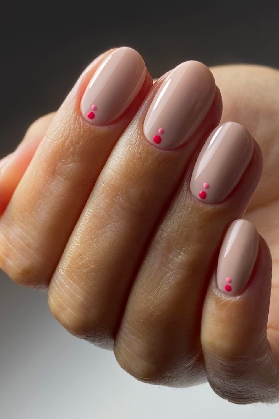 51. Nude Nails with Tiny Pink Hearts - nail art idea for women over 40