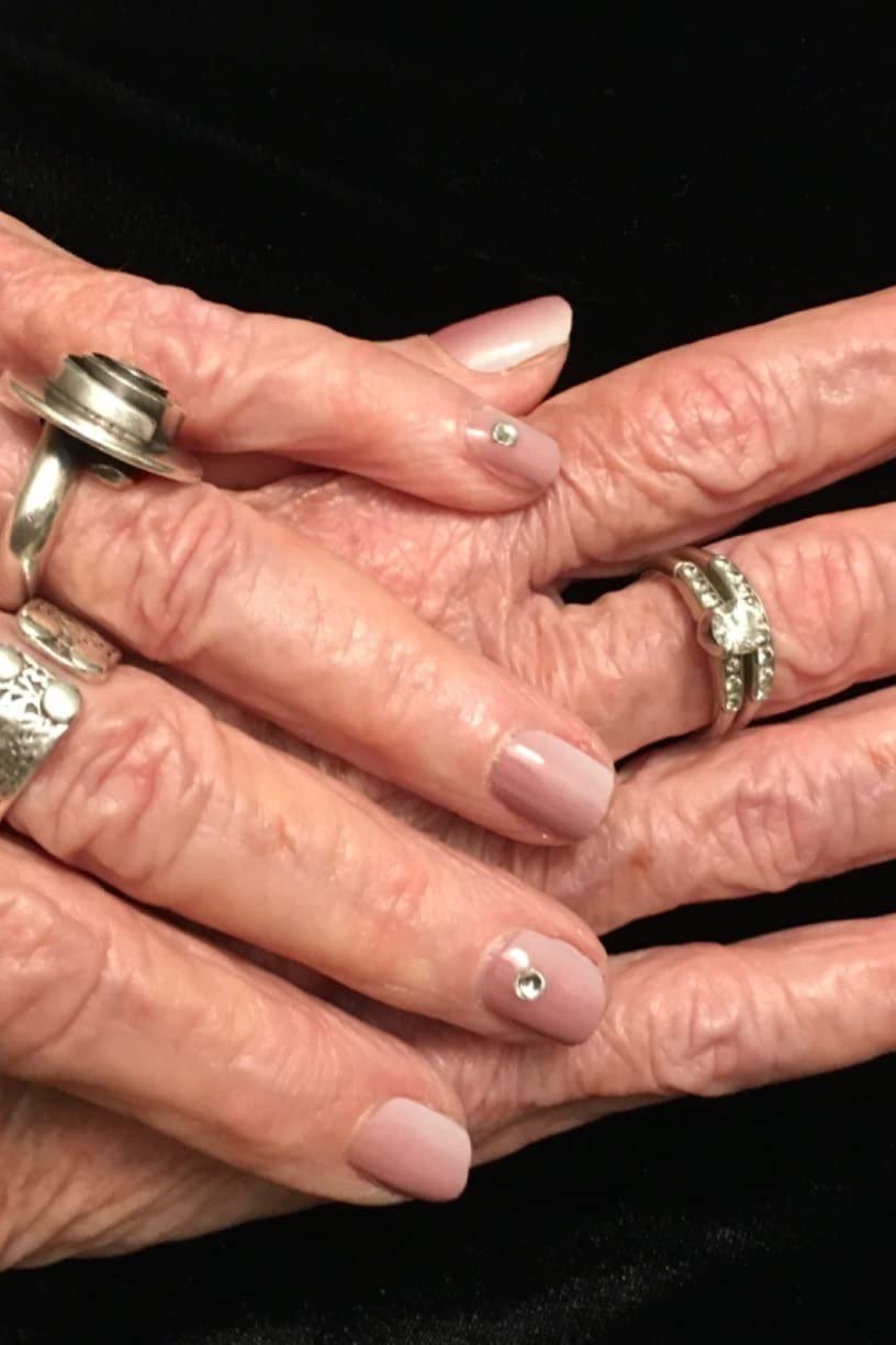 Soft Mauve Pink Sheer With Stacked Rings - nail color idea for women over 60