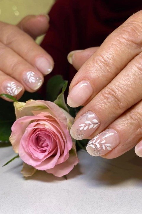 Nude With White Floral Art - nail color idea for women over 60