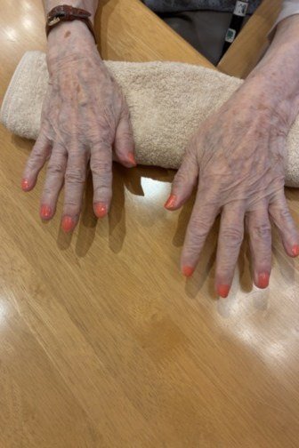 Soft coral nails, older hands