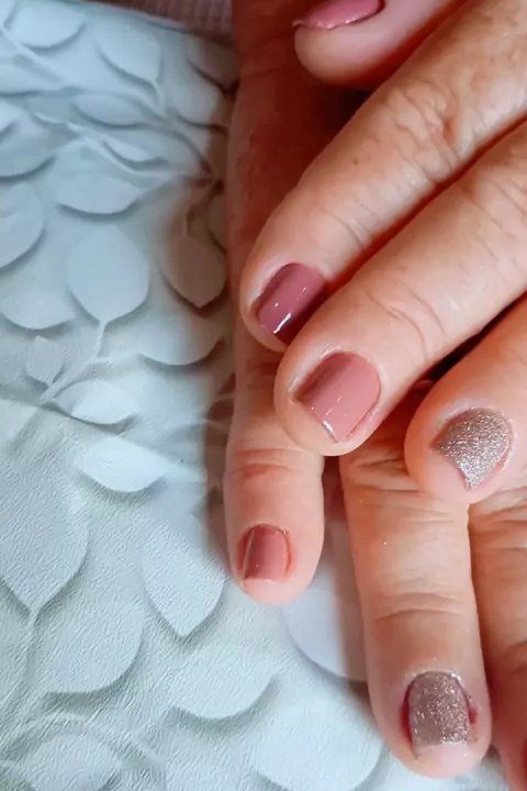 Mauve With Glitter Accents - nail color idea for women over 60