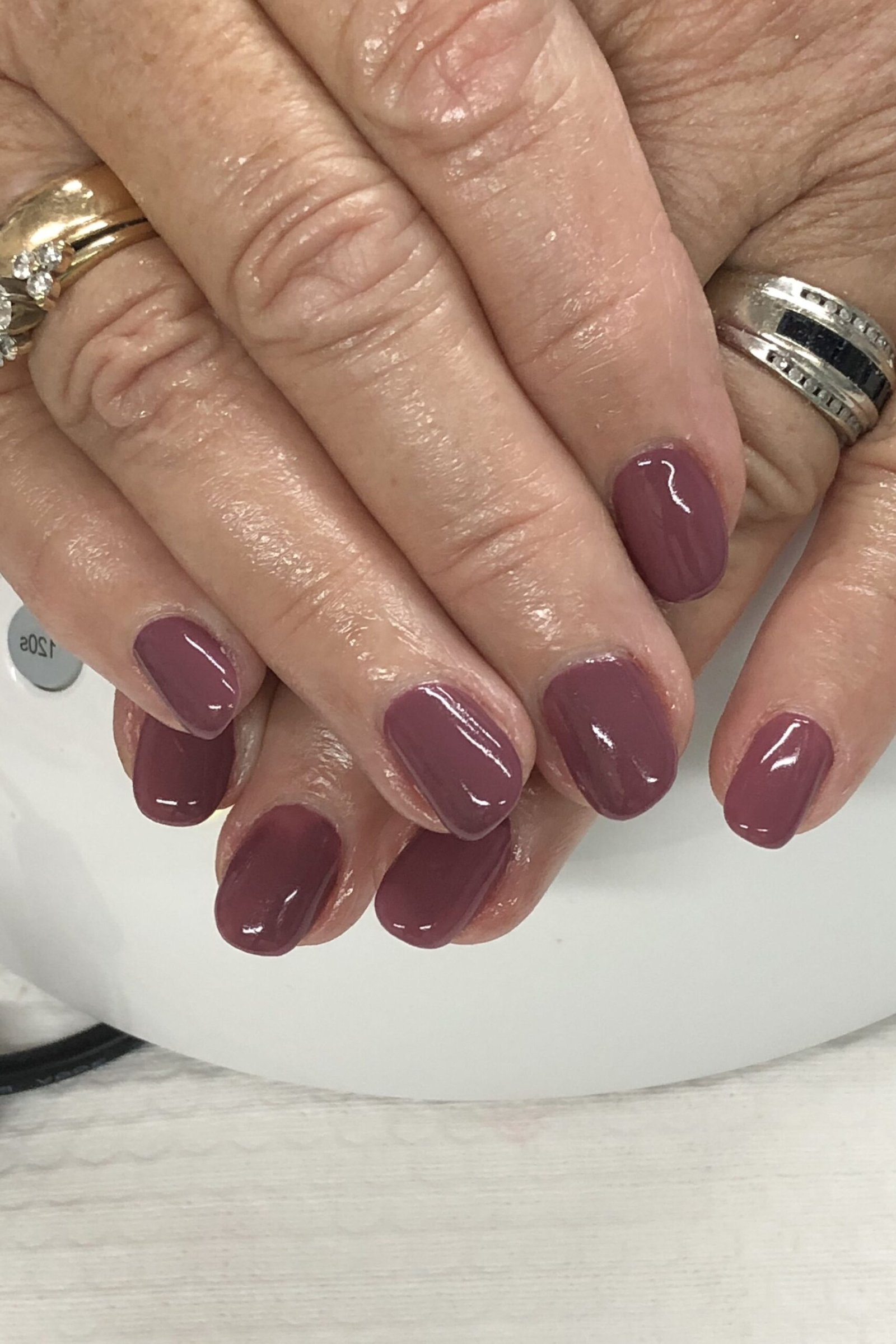Muted Mauve Taupe Almond - nail color idea for women over 60