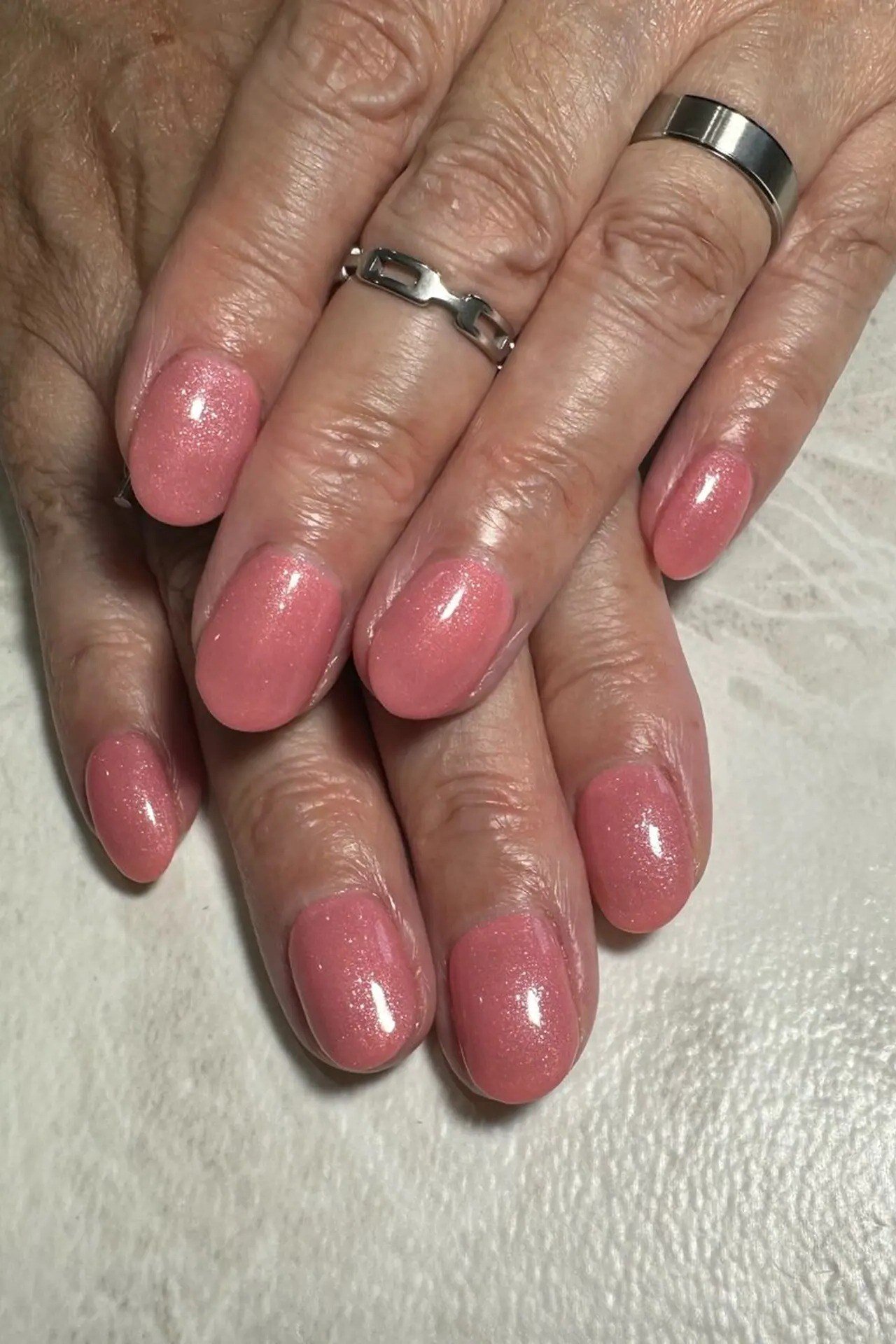 Glossy Rose Pink Stacked Hands - nail color idea for women over 60