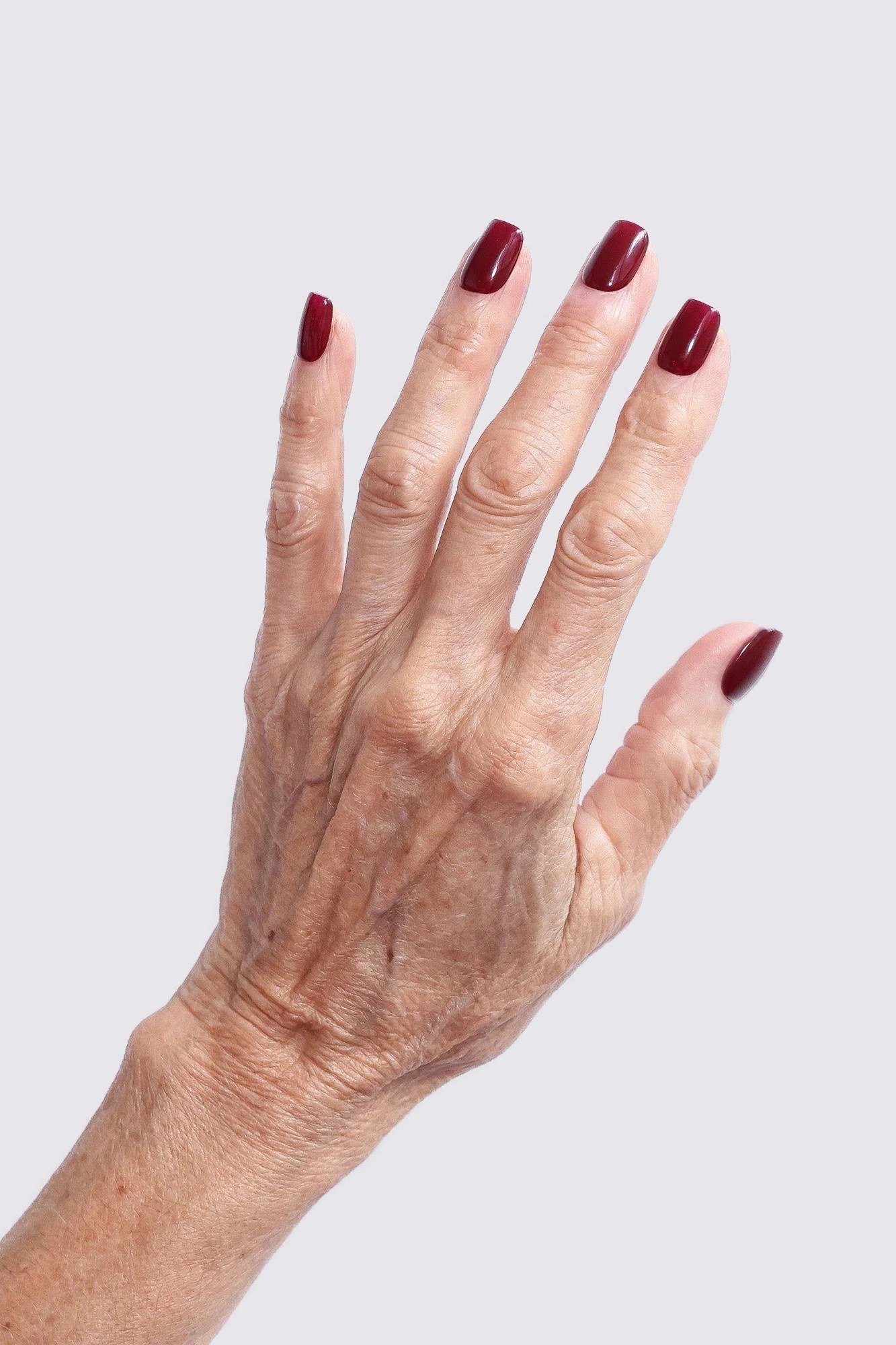 Deep Red on Old Hand - nail color idea for women over 60