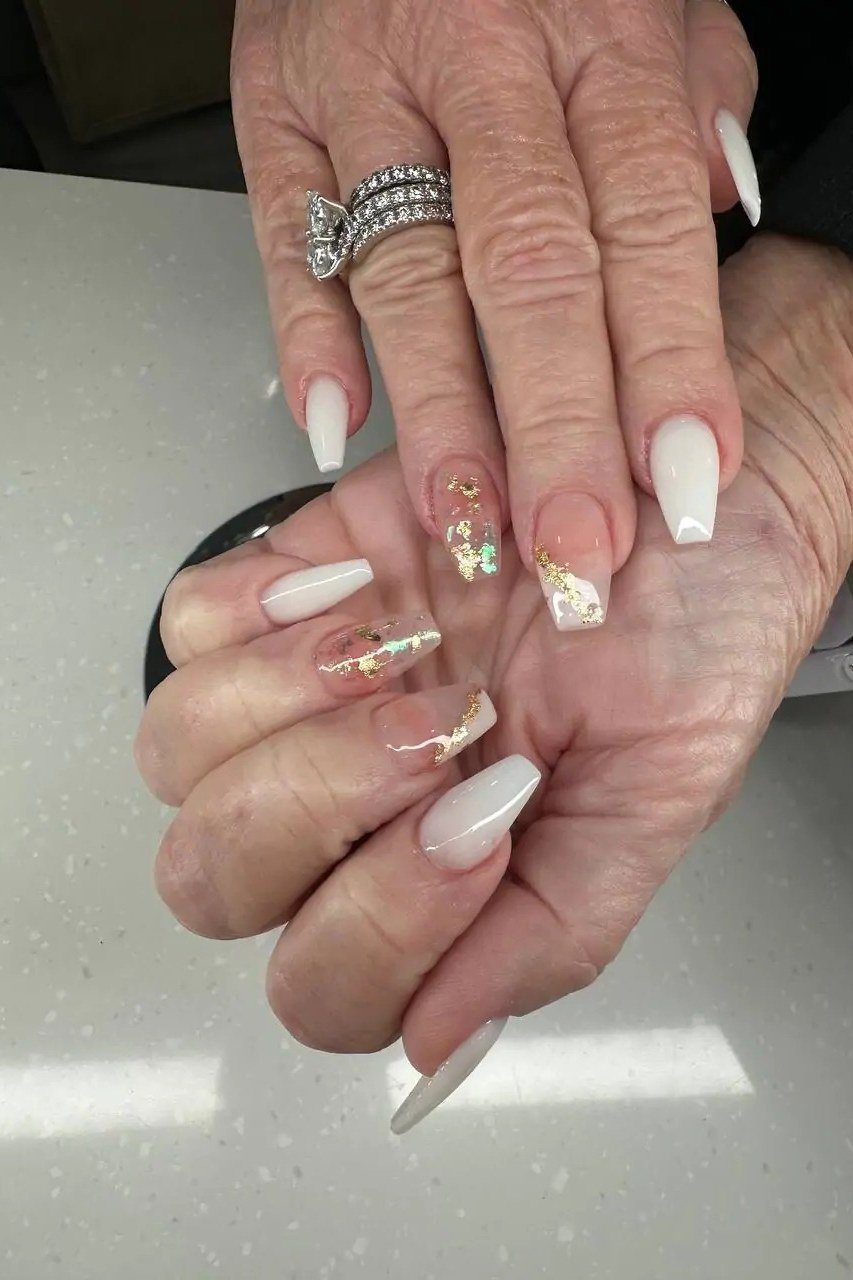 White square nails, mature hands with rings