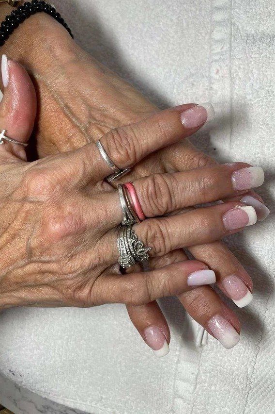 French almond nails, elderly hands
