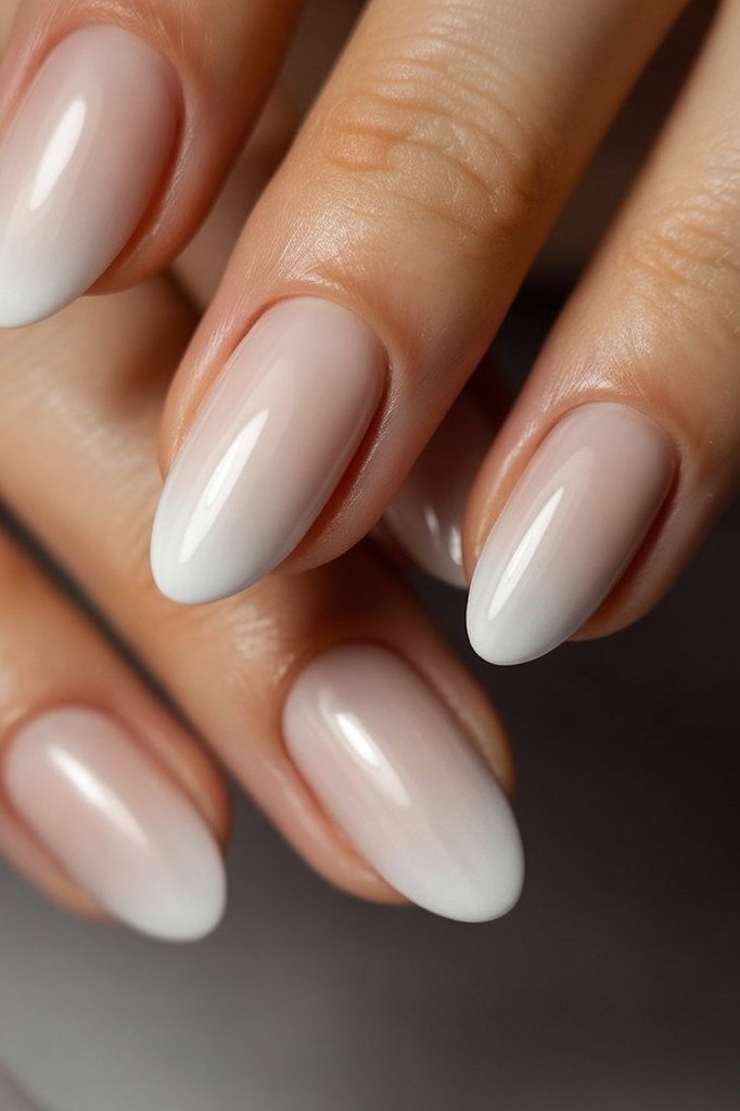 High-Gloss White Almond Ombre - nude ombre nails for women over 50