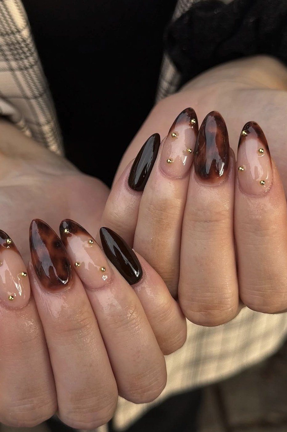 Old money tortoiseshell dark nails manicure for women over 60