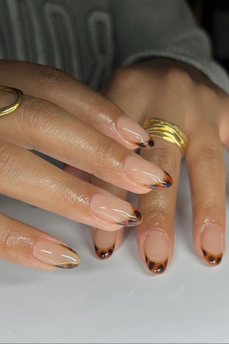 Old money sheer nails with tortoise tips manicure for women over 60