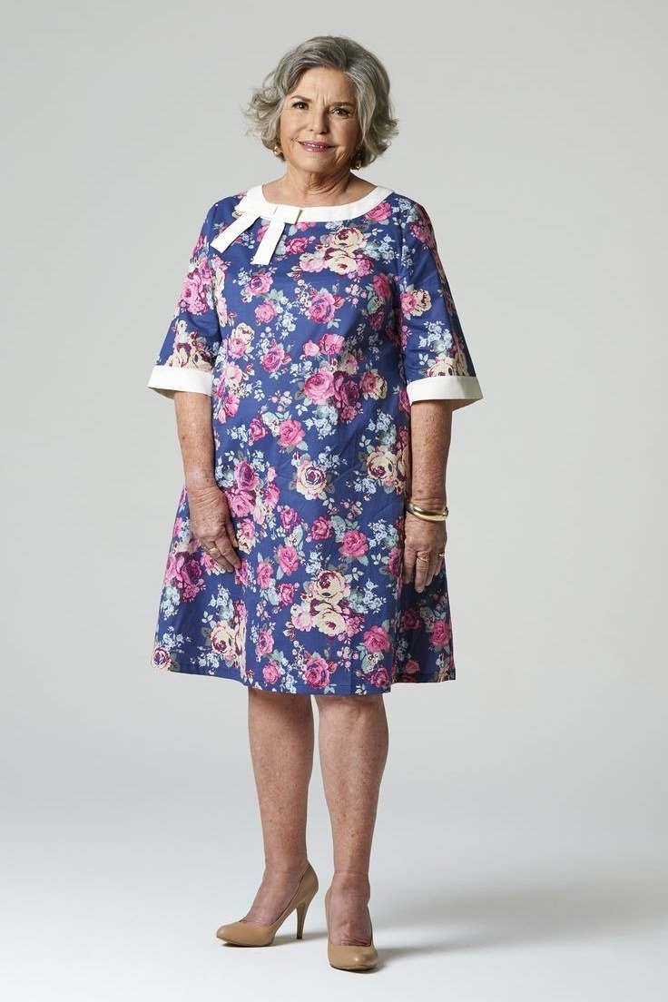 Trendy outfit for women over 70: blue floral midi dress