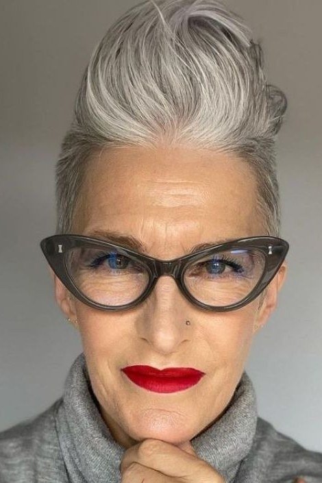 Silver quiff pixie with cat-eye glasses, front view - pixie haircut for women over 60