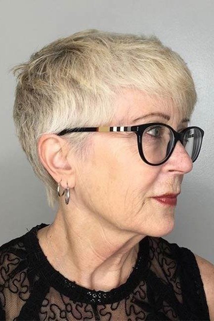 Blonde pixie with black glasses, side view - pixie haircut for women over 60